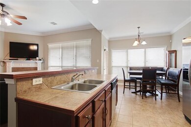 The open floor plan is perfect for mingling with g