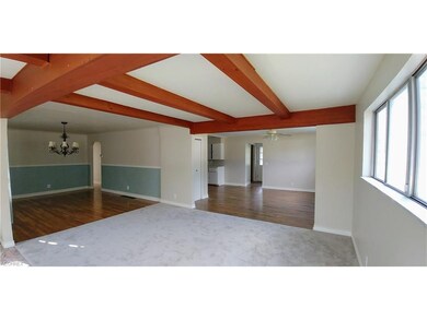 Living room, dining room and eat- in kitchen