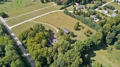 Almost 6 acres to gives this amazing home privacy!
