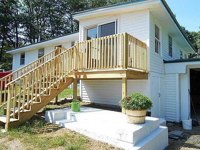 Exterior Front. New Entrance Deck...