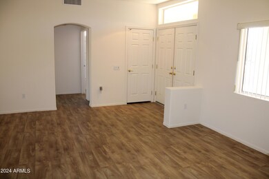 LIVING, DINING, AND FOYER