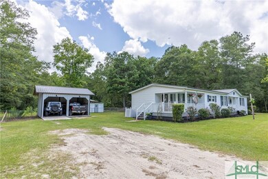 Side view with 2 car carport