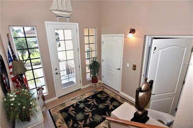 Foyer - garage entrance, elevator and stairwell up