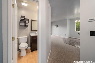 Half Bath and Entry into Living Area