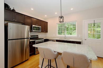 Updated kitchen with generous island with seating