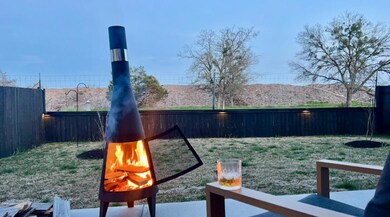 View of fenced backyard