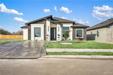 View of front of property featuring a front lawn