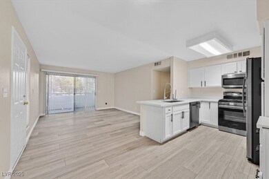 Kitchen with appliances with stainless steel finis