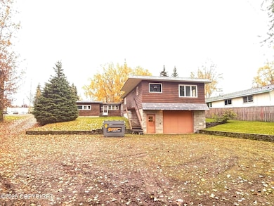 Garage & unfinished unit above it.