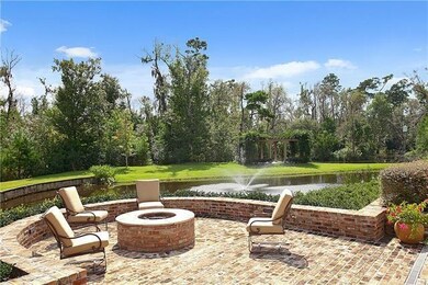 Cozy up next to this fire pit overlooking the pond