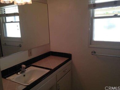 Gotta  love this  1950's  bathroom  with  pink and