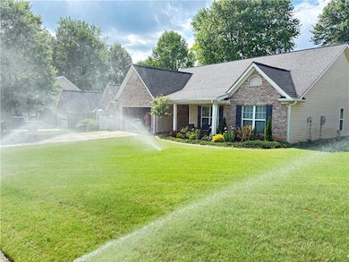 Sprinkler system keeps the lawn looking like golf 