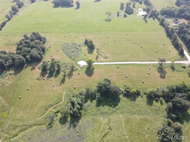 Aerial view of property and surrounding area