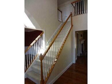Exterior Front. A welcoming two story foyer.