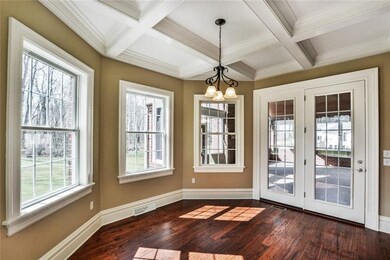 MORNING ROOM WITH PLENTY OF NATURAL LIGHT. COFFERE