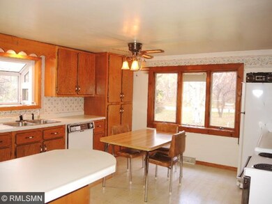 Bright ...large kitchen with custom cabinets and l