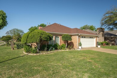 Single story home with a chimney, driveway, an att
