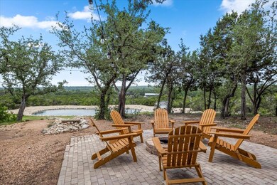 View of patio / terrace with an outdoor fire pit