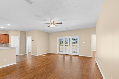 Family room looks out on the back porch and yard.