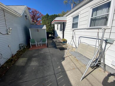 Concrete Patio & Storage Shed