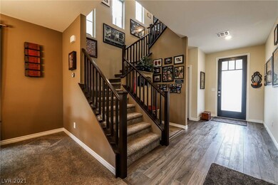 Open entranceway, with beautiful flooring and room