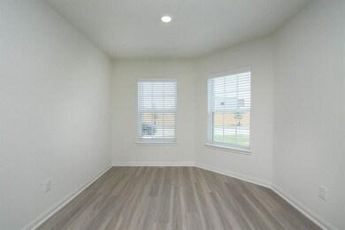 e flex room set off from the living room makes the perfect space for a home office, game room or more.