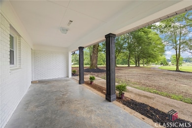 1180 Treadwell Bridge Rd, Statham, GA 30666 - photo 3