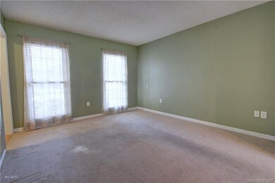 LIVING ROOM: The traditional layout offers space t