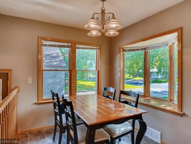 Natural sunlight fills the dining room.
