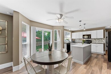 The durable waterproof LVP floors continue to the 