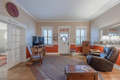 Beautiful hardwood floors welcome you to this love