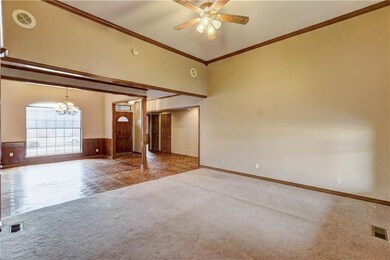 Living room #1 looking into formal dining and foye