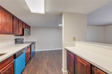 Kitchen featuring appliances with stainless steel