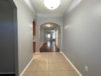 Stunning view from spacious foyer looking back to family room