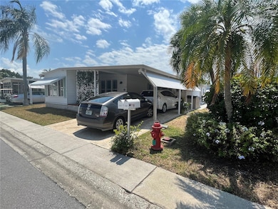 Two cars fit in carport.