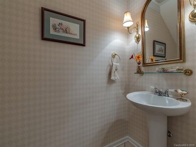 1/2 Bath on Main Level Features Pedestal Sink and 