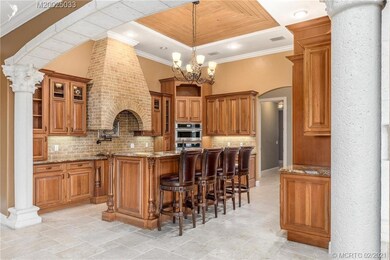 Gourmet kitchen with wall oven and microwave, gas