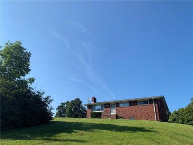 Home sits on a beautiful hill top with great views
