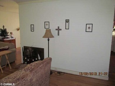 Living Room - Refinished floors, newly painted wal