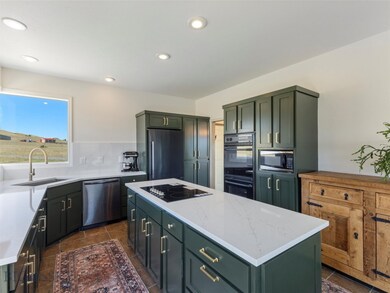 Kitchen Island w/New Cooktop and Quartz