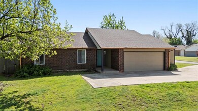 Ranch-style home featuring brick siding, a front l
