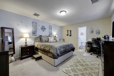 Primary bedroom with ensuite bathroom