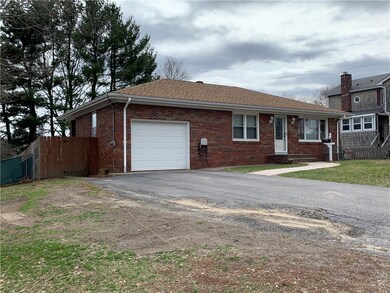 Garage with Remote Opener and Driveway with Parkin