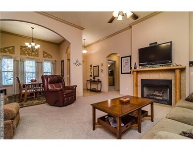 Interior Space/Layout. Living room is open to the formal dining room  and entryway.
