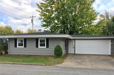 Large 2-1/2 car garage & double wide driveway.