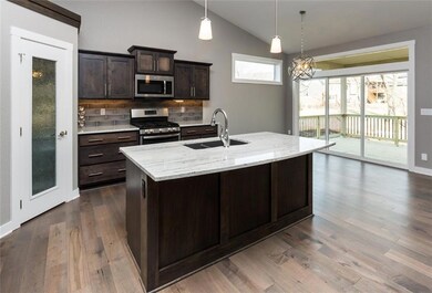 Kitchen with walk in pantry.