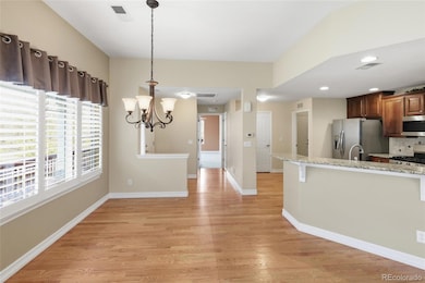 7587 S Biloxi Way, Aurora, CO 80016 - photo 2