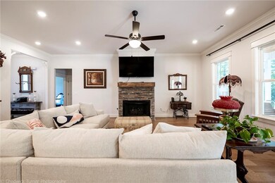 Attractive stone, gas fireplace adds a particular coziness to the room.