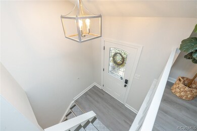Foyer entrance featuring new LVP flooring and an i