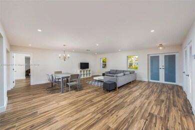 Huge living room can be living/formal dining combination or chandelier moved to have one large spacious living area. 